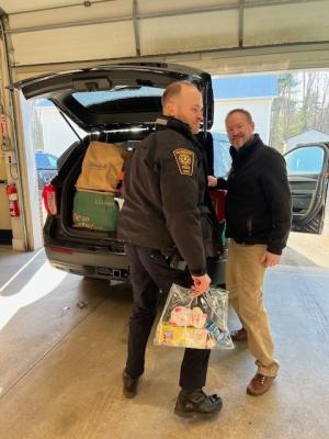 Falmouth Police load vehicle with donated goods