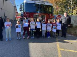 elementary school artists who off calendars at Fire EMS event