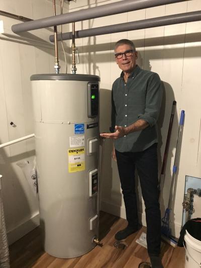 Councilor Lafond with his heat pump water heater