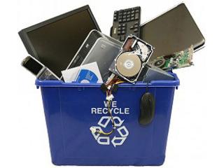 electronics in a recycling bin